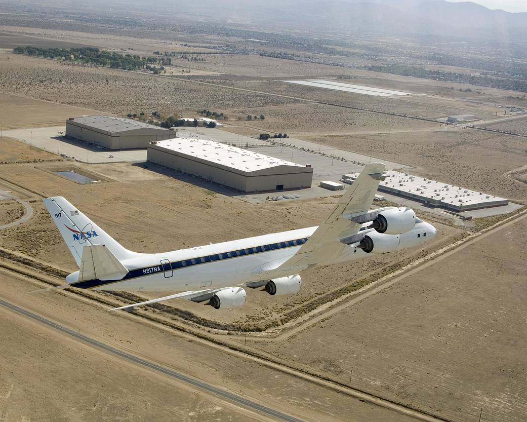 NASA's DC-8 Banks Low over the Dryden Aircraft Operations Facility