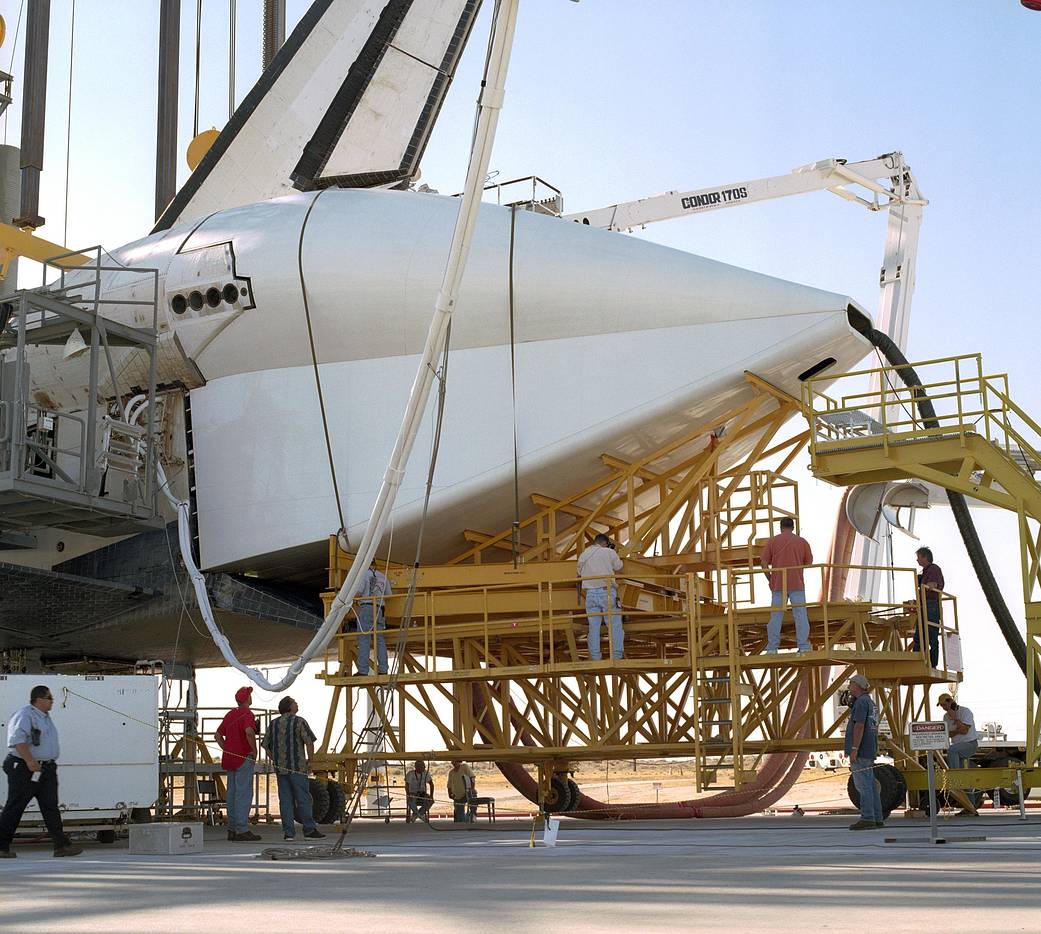 STS-114 Technicians Attach the Tail Cone to the Space Shuttle Discovery