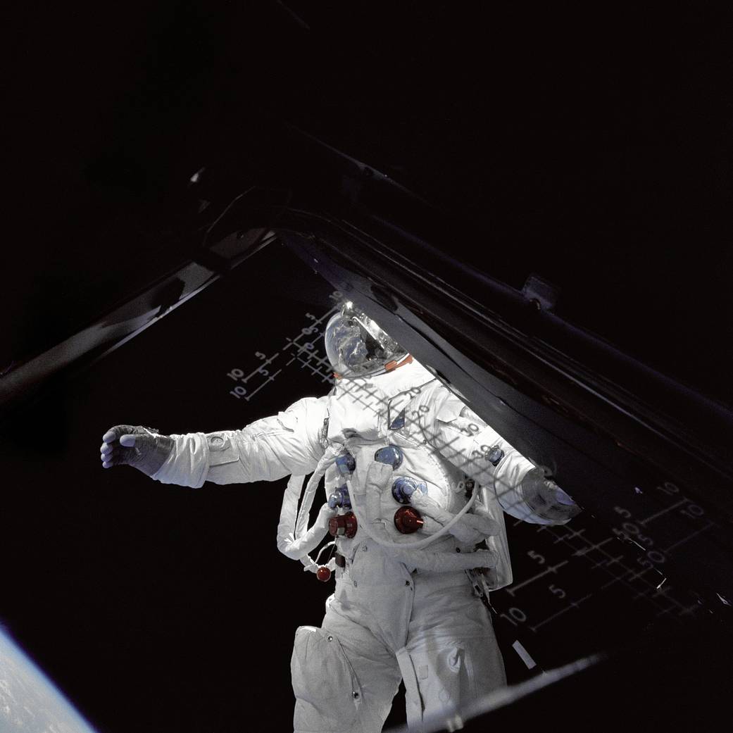Astronaut on spacewalk outside lunar module