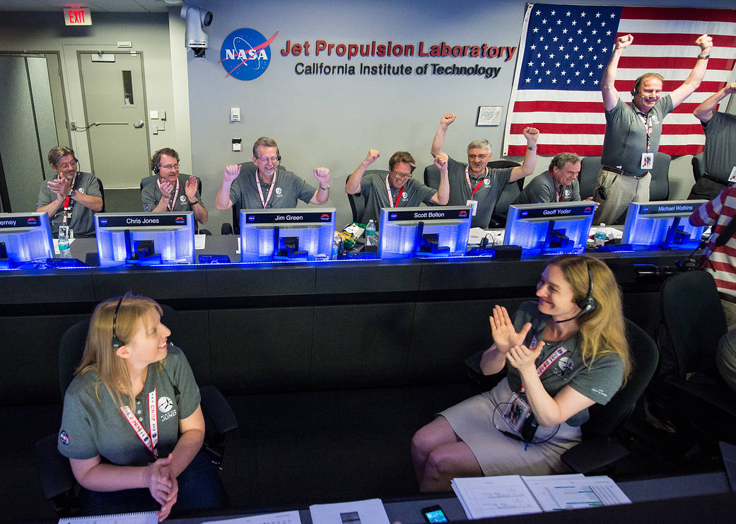Inside mission control room, directors cheer news of successful Juno arrival at Jupiter