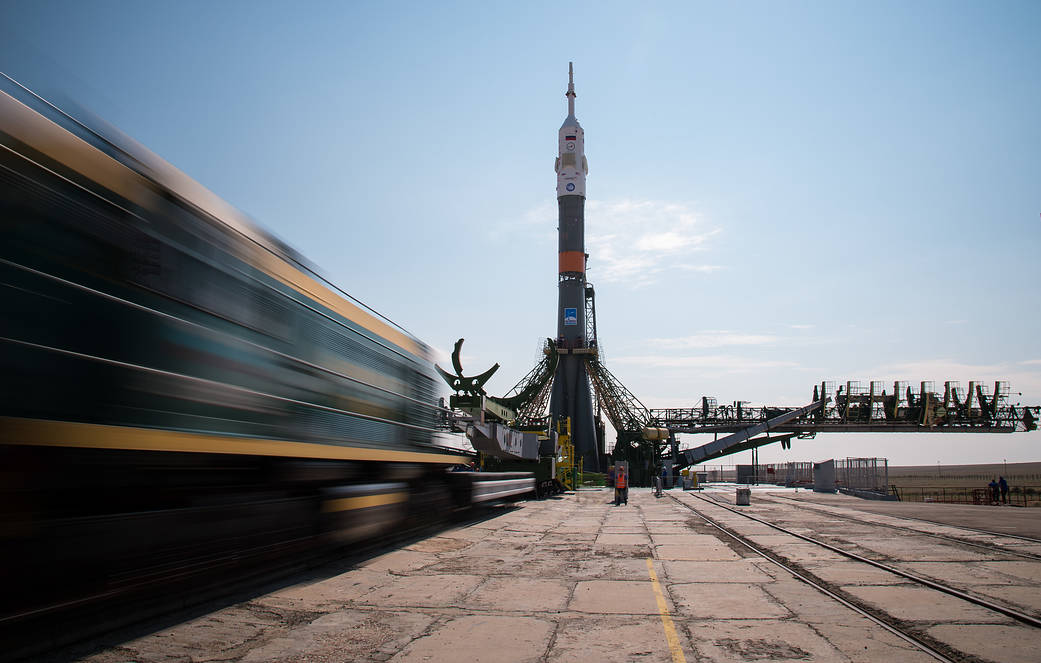 The Soyuz MS-01 spacecraft is raised vertical after it was rolled out by train to the launch pad at the Baikonur Cosmodrome, Kaz