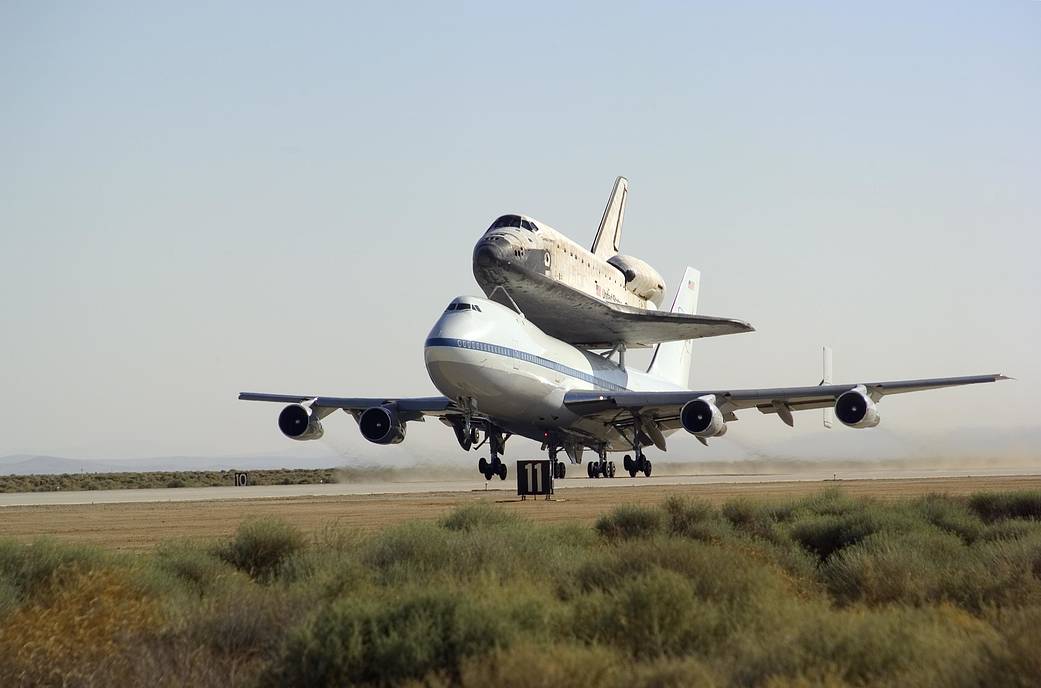 NASA's 747 Shuttle Carrier Aircraft with the Shuttle Discovery on Top Lifts Off