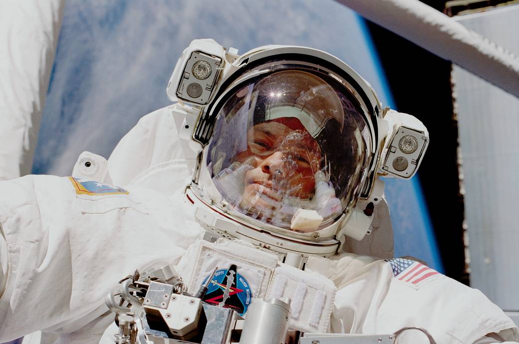 Astronaut Michael E. Lopez-Alegria, mission specialist, is photographed in this close-up view during one of the STS-92 sessions of extravehicular activity (EVA).