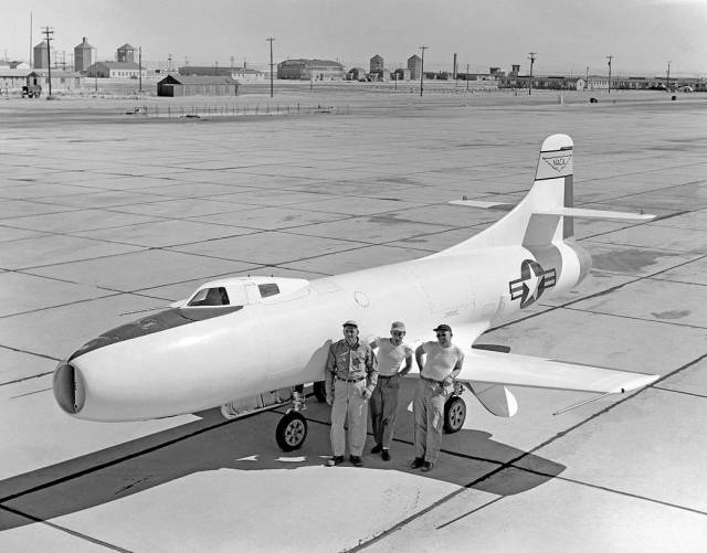 D-558-I is on the ramp at South Base, Edwards Air Force Base with three crew members.