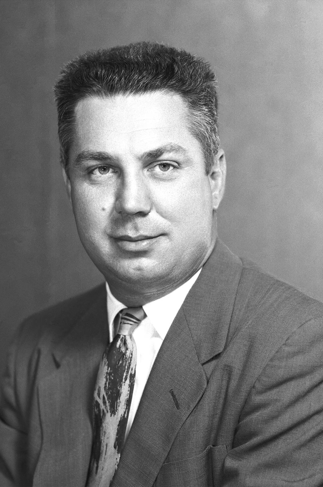 Black and white portrait of former Center Director Walter Williams