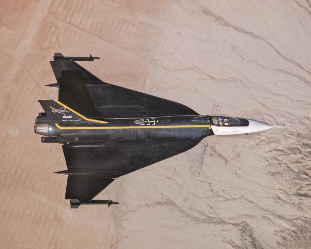 F-16XL TN 849 shows off its unusual "cranked arrow" double-delta wing platform during a functional check flight to check out its newly installed digital flight control system in this 1997 photo.