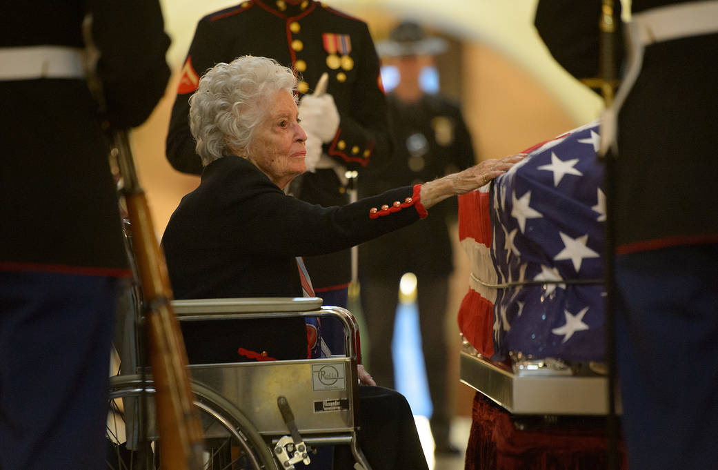Annie Glenn and flag-draped casket of Sen. John Glenn