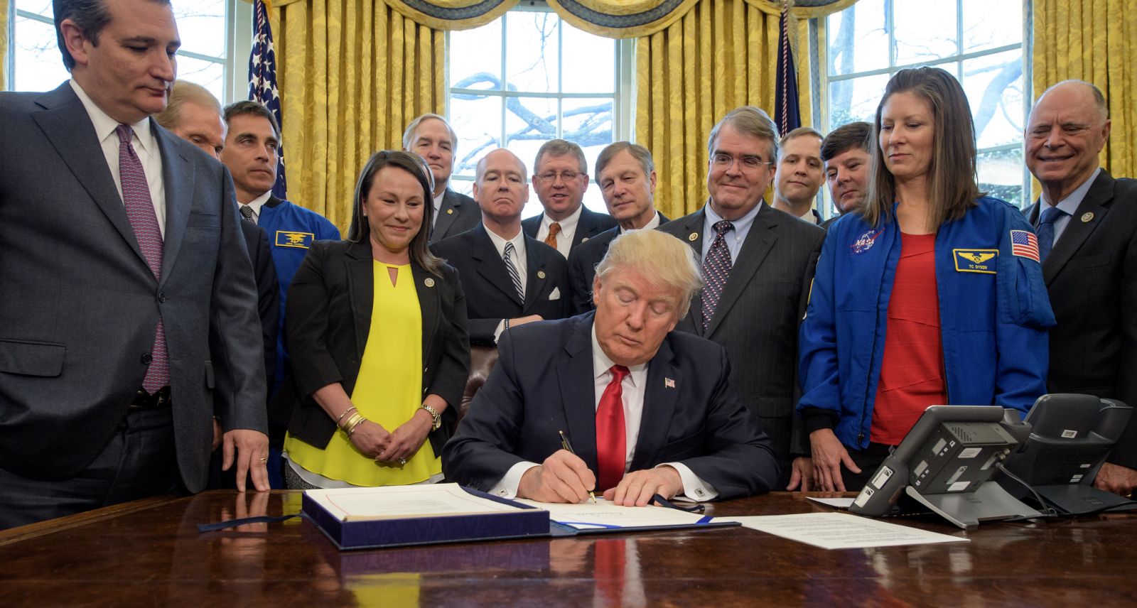 President Donald Trump signs the NASA Transition Authorization Act of 2017
