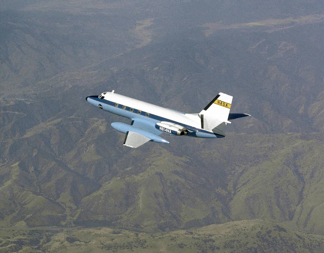 JetStar in flight over California desert.