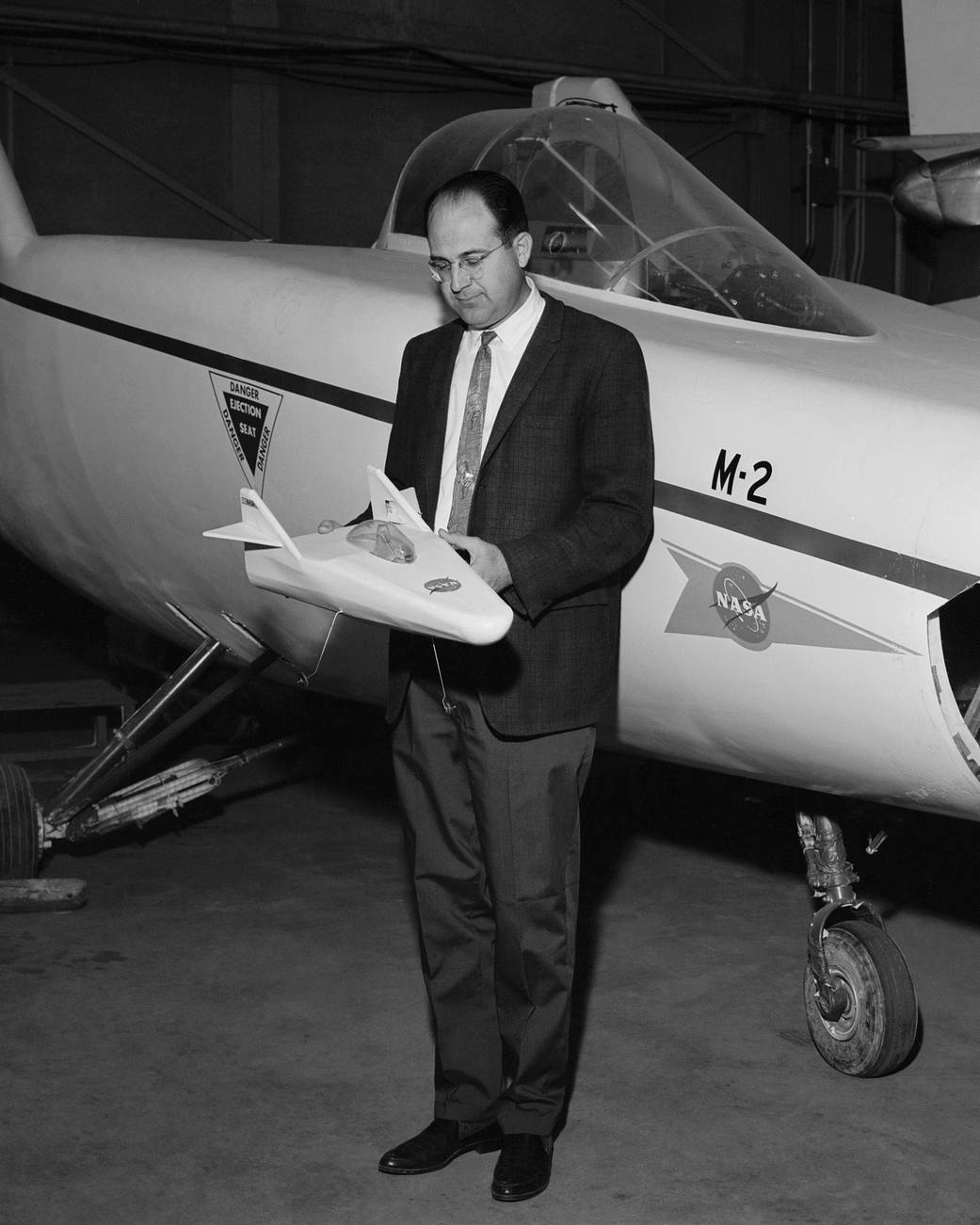 Dale Reed with a Model of the M2-F1 and the Actual M2-F1 Lifting Body