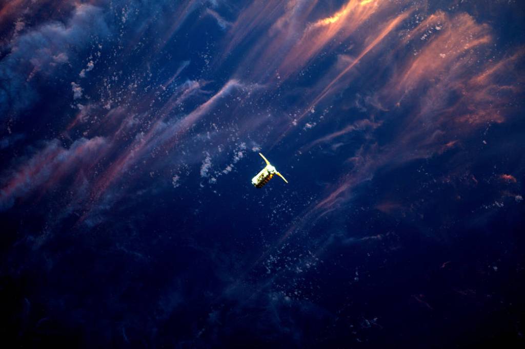Cygnus Spacecraft Approaches Space Station in the Sunset