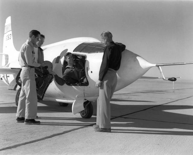 NACA Pilot with X-1 and Crew Members