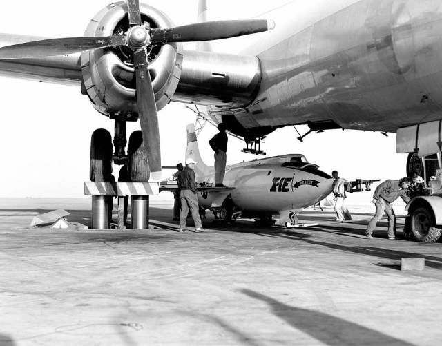 Hydraulic Lifts Lower B-29 Mothership over X-1E
