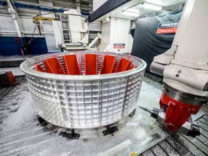 Circular metal part of crew module for Orion spacecraft