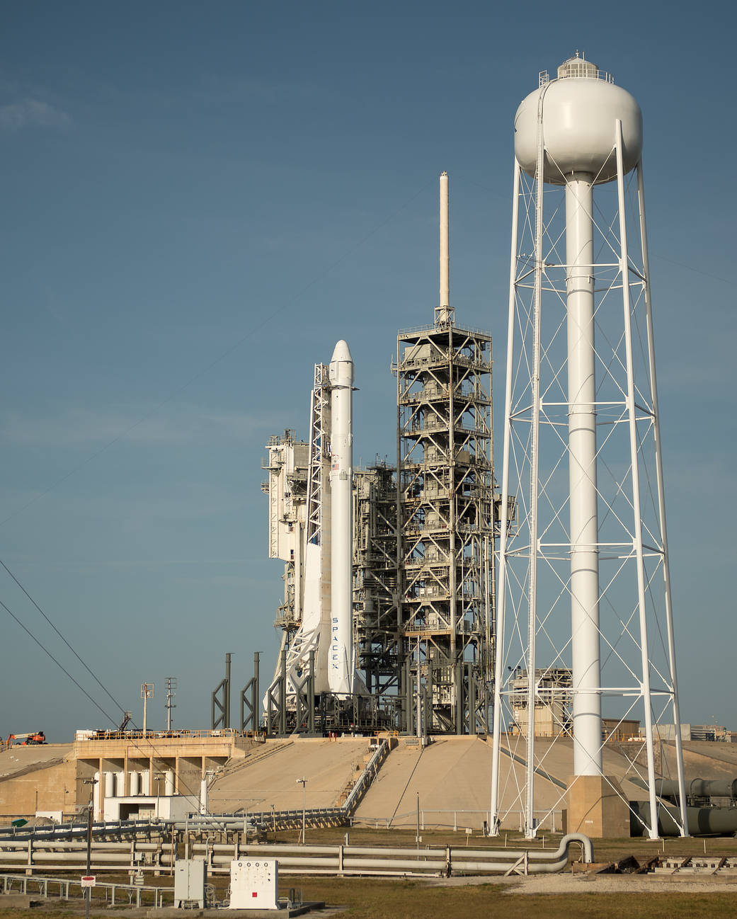 SpaceX Falcon 9 rocket vertical at launch pad