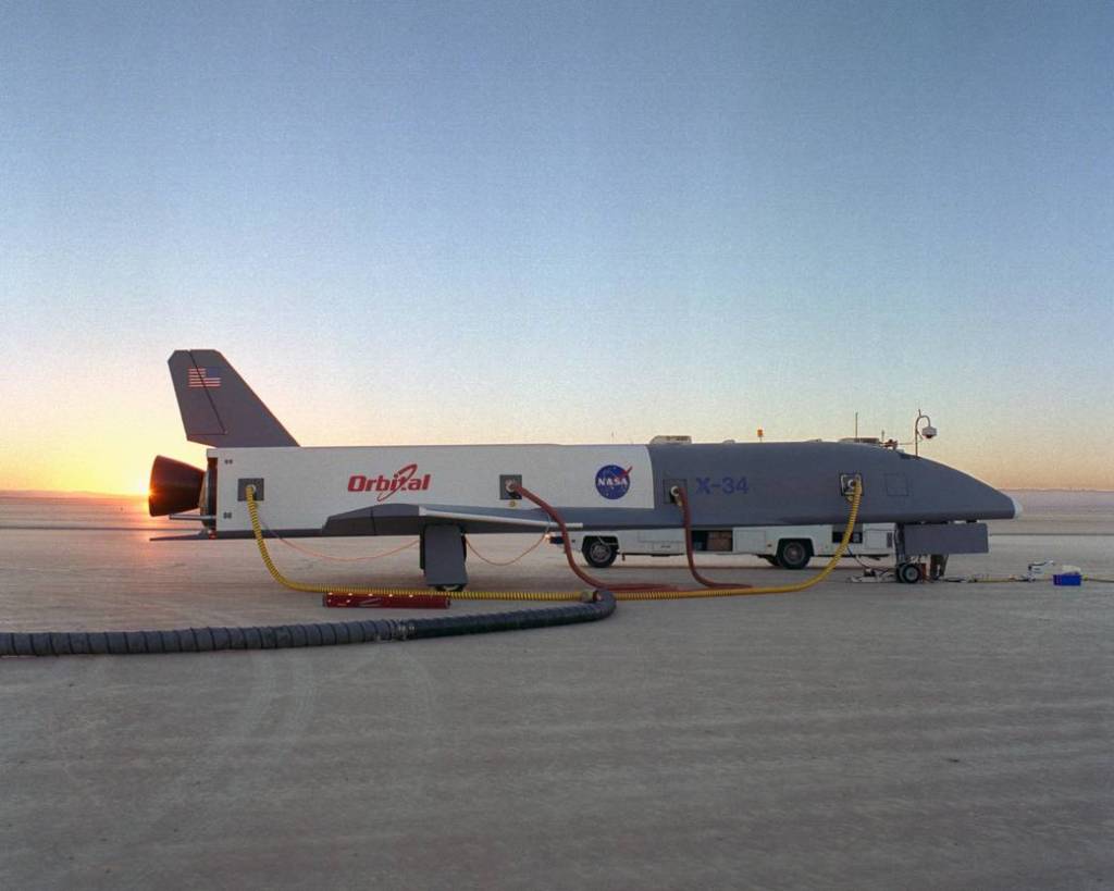X-34 Technology Demonstrator Towed Behind Semi-Truck