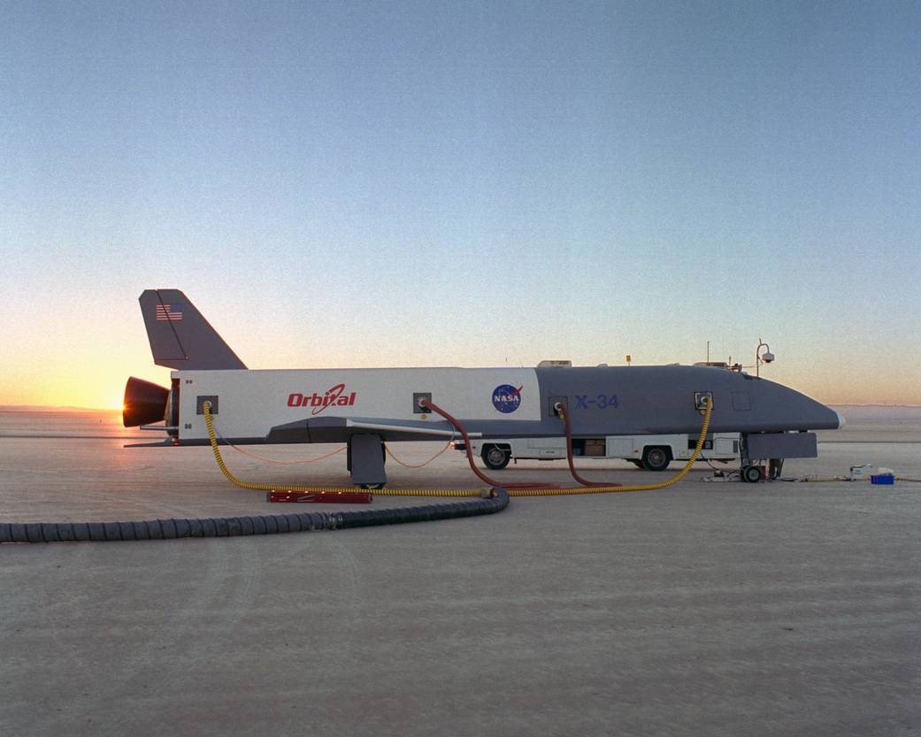 X-34 Technology Demonstrator Towed Behind Semi-Truck