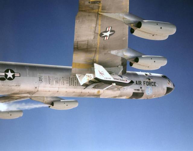 Carried Aloft: X-38 Under B-52 Wing