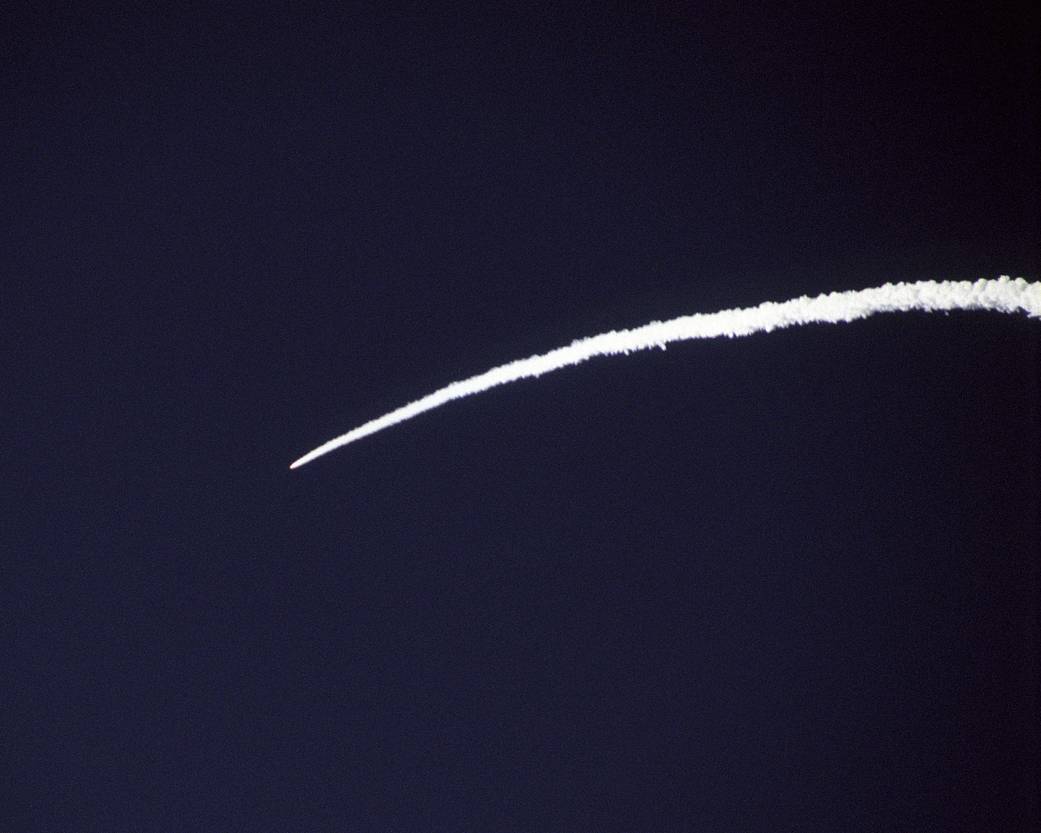 Pegasus Rocket Booster Leaves Arc in Pacific Sky 