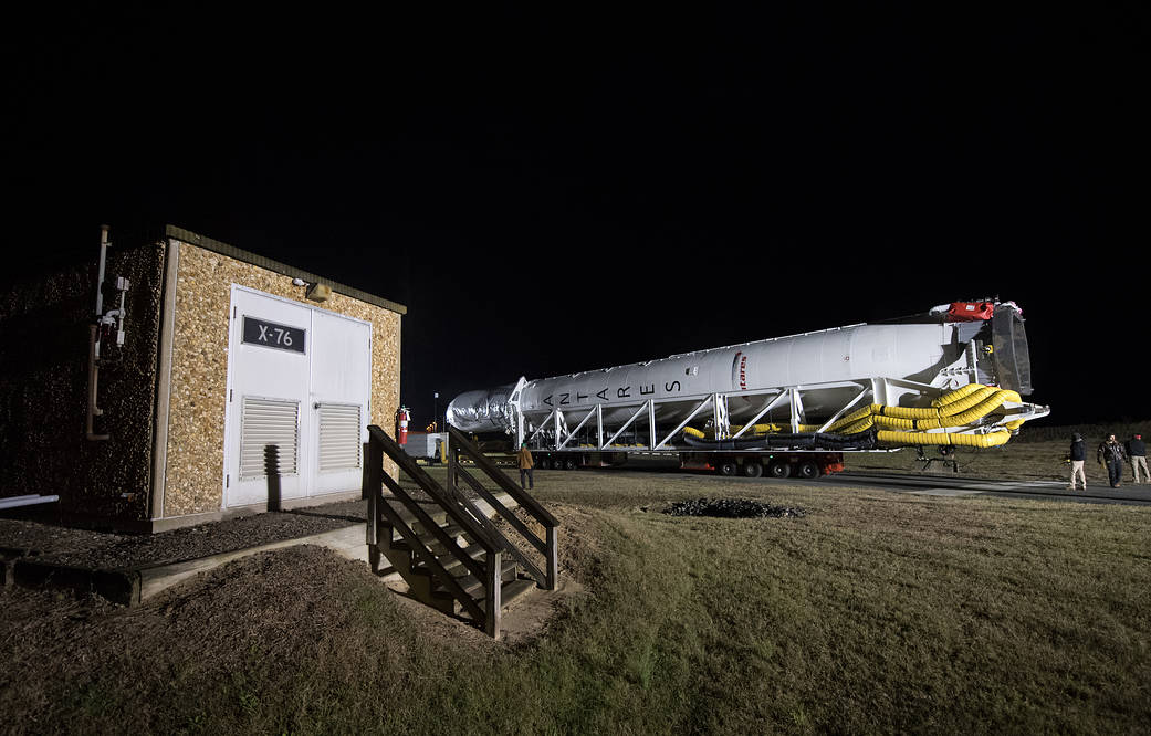 Antares rocket horizontal rolling out to launch pad