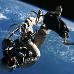 Astronaut Ed White floating in space outside Gemini spacecraft