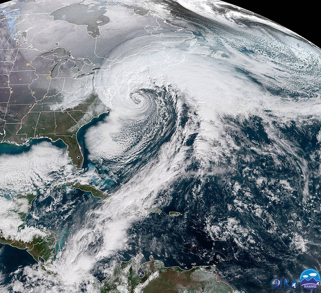 Satellite image of United States with storm clouds off East Coast