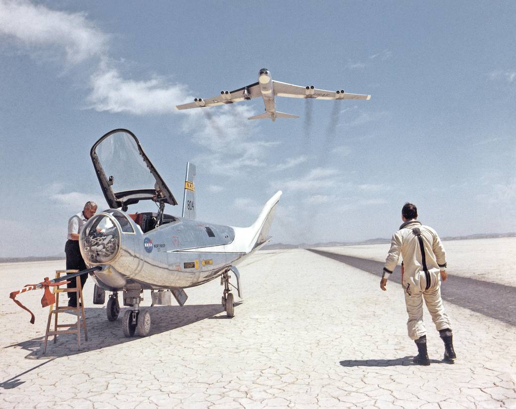 HL-10 on Lakebed with B-52 Flyby
