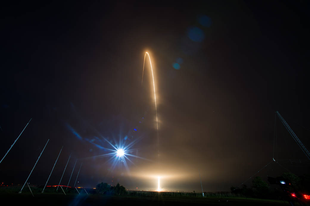 Orbital ATK Antares rocket streaks toward orbit after liftoff
