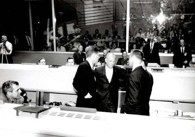 President John F. Kennedy visits Mercury's Flight Control Area a few days after John Glenn's flight in February 1962.