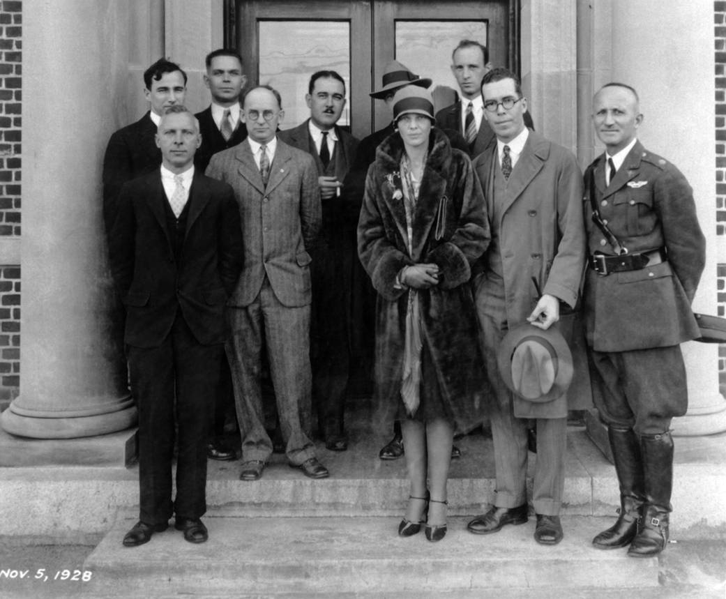 Amelia Earhart (front row, center) on the steps of Langley Research Building in 1928 before a tour. 