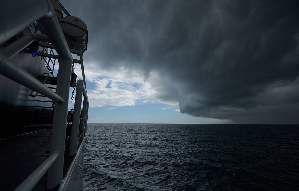 A quick moving storm passes as teams from NASA and SpaceX practice procedures for medical emergency evacuation