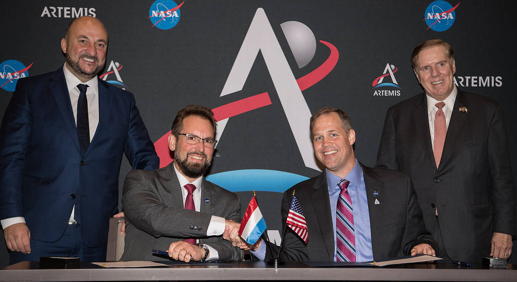 NASA Administrator Jim Bridenstine, right, and Dr. Marc Serres, chief executive officer, Luxembourg Space Agency