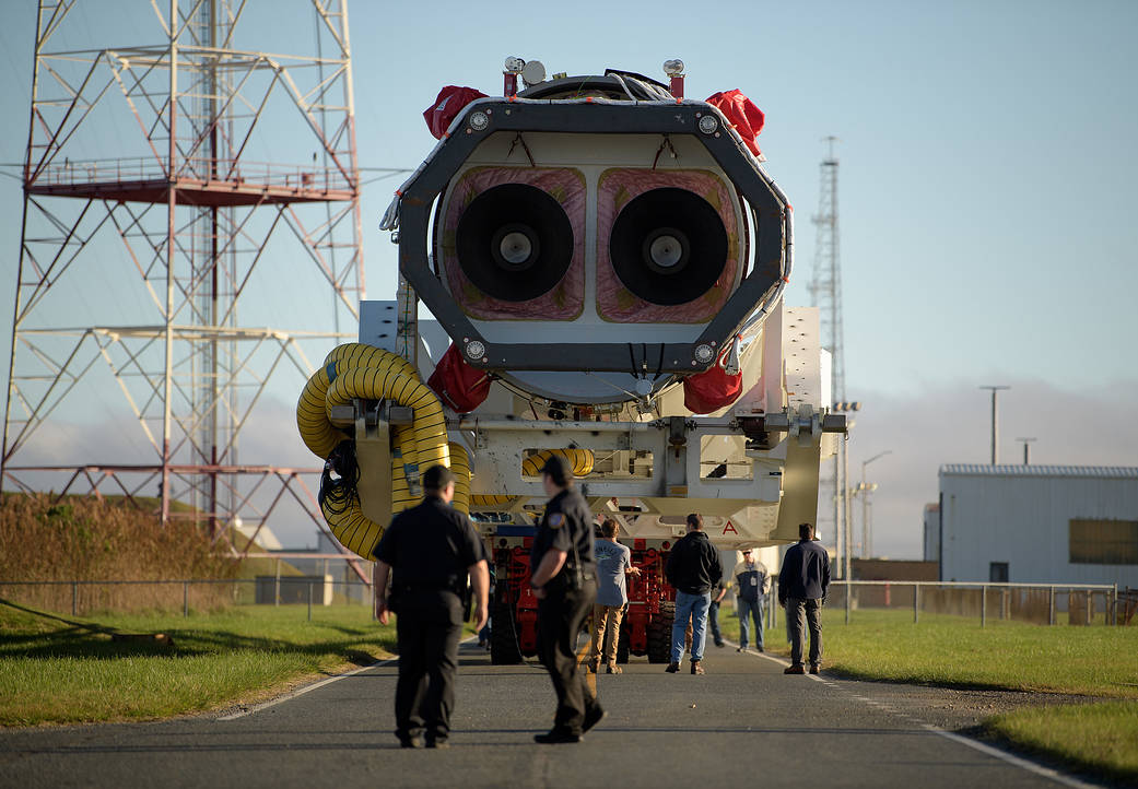 A Northrop Grumman Antares rocket is seen as it rolls out to Pad-0A, Tuesday, Oct. 29, 2019, at NASA's Wallops Flight Facility