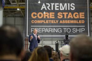 Administrator Bridenstine speaking with Artemis sign in background