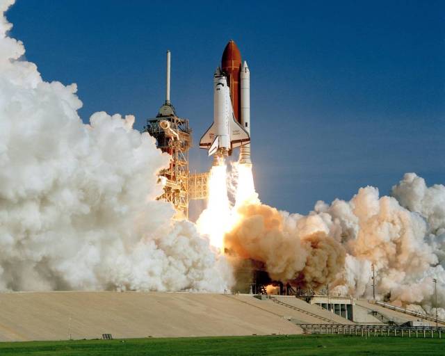 Space Shuttle Discovery soars away from Launch Pad 39A at the Kennedy Space Center, beginning its maiden voyage and a storied spaceflight career that spanned more than 26 years. 