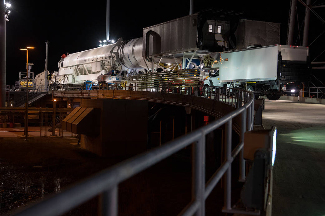 A Northrop Grumman Antares rocket carrying a Cygnus resupply spacecraft is seen horizontal on Pad-0A for the final cargo load