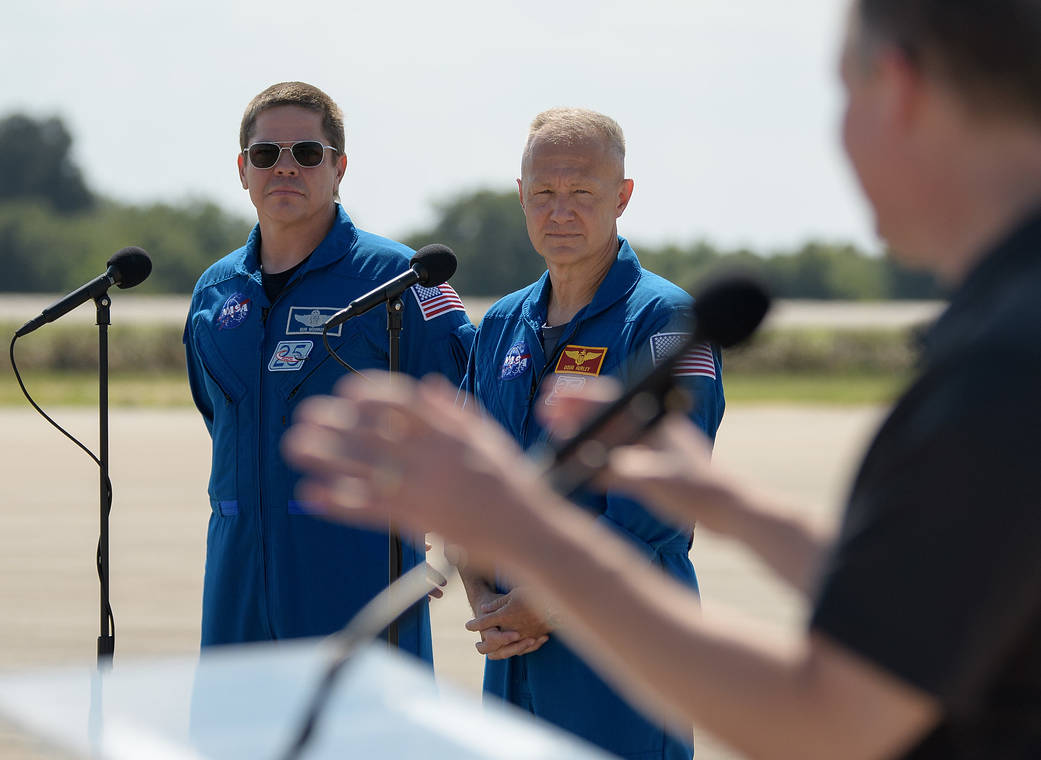 NASA astronauts Robert Behnken, left, and Douglas Hurley 