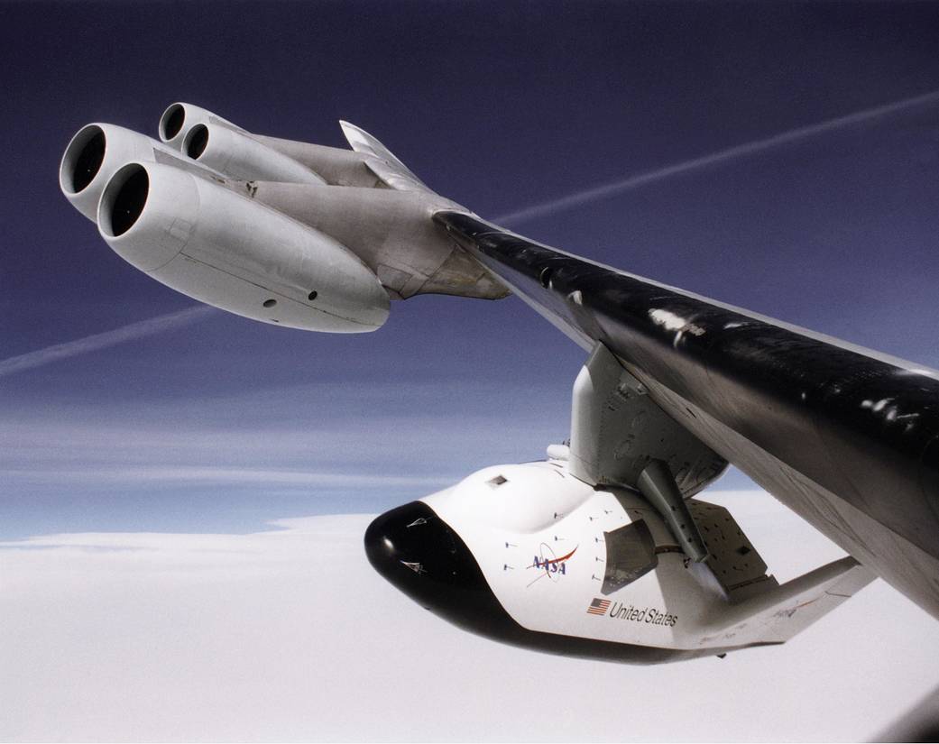 A unique, close-up view of the X-38 under the wing of NASA's B-52 mothership.