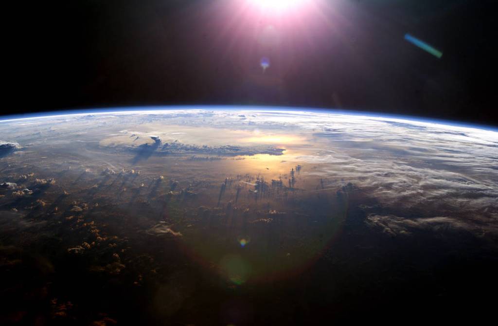 Space Station View of Sun Over Earth From Space