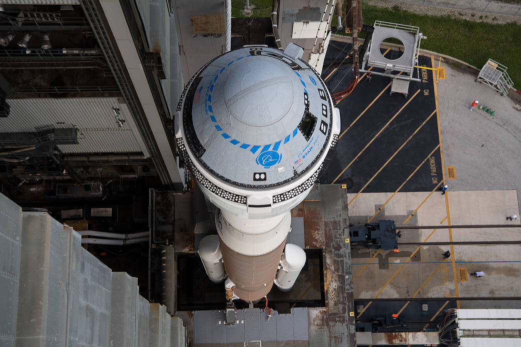 A United Launch Alliance Atlas V rocket with Boeing’s CST-100 Starliner spacecraft aboard is seen as it is rolled out of the Vertical Integration Facility to the launch pad at Space Launch Complex 41 ahead of the Orbital Flight Test-2 (OFT-2) mission
