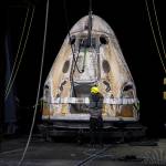 The SpaceX Crew Dragon Endeavour spacecraft is lifted onto the GO Navigator recovery ship after it landed in the Gulf of Mexico off the coast of Pensacola, Florida, Mon., Nov. 8, 2021.