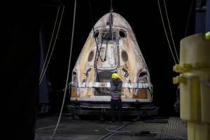 The SpaceX Crew Dragon Endeavour spacecraft is lifted onto the GO Navigator recovery ship after it landed in the Gulf of Mexico off the coast of Pensacola, Florida, Mon., Nov. 8, 2021.