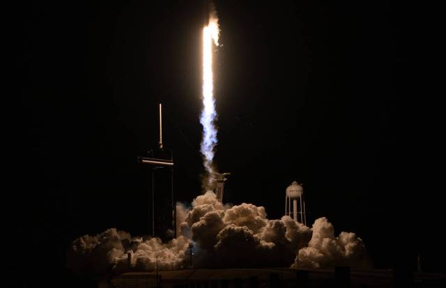 A SpaceX Falcon 9 rocket launches with NASA’s Imaging X-ray Polarimetry Explorer (IXPE) spacecraft onboard from Launch Complex 39A, Thursday, Dec. 9, 2021, at NASA’s Kennedy Space Center in Florida. 