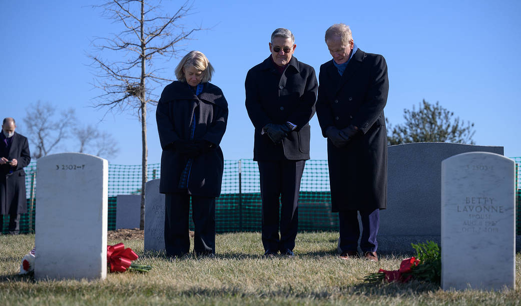 NASA Deputy Administrator Pam Melroy, left, Administrator Bill Nelson, and Associate Administrator Bob Cabana, right, pay respects during a ceremony that was part of NASA's Day of Remembrance, Thursday, Jan. 27, 2022, at Arlington National Cemetery.