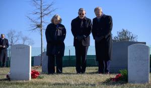 NASA Deputy Administrator Pam Melroy, left, Administrator Bill Nelson, and Associate Administrator Bob Cabana, right, pay respects during a ceremony that was part of NASA's Day of Remembrance, Thursday, Jan. 27, 2022, at Arlington National Cemetery.