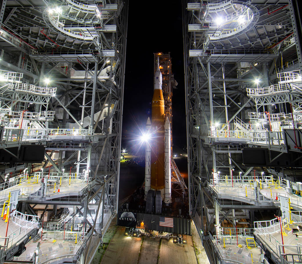 NASA’s Space Launch System (SLS) rocket with the Orion spacecraft aboard is seen atop a mobile launcher as it rolls out of the Vehicle Assembly Building to Launch Pad 39B, Tuesday, Aug. 16, 2022, at NASA’s Kennedy Space Center in Florida.