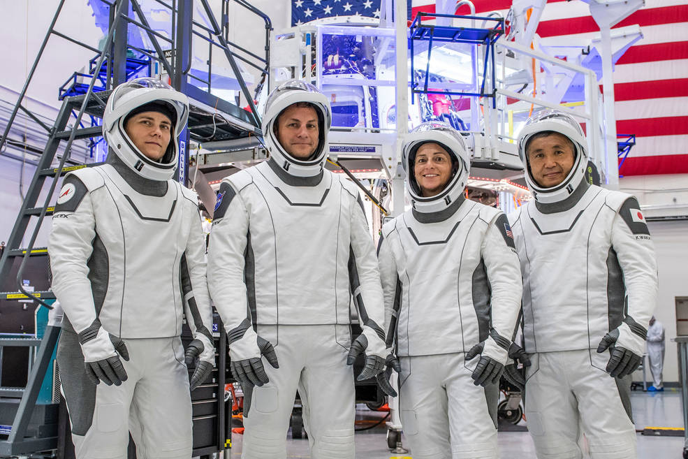 The four members of the SpaceX Crew-5 mission pose for a portrait in their Crew Dragon flight suits at SpaceX headquarters in Hawthorne, California.