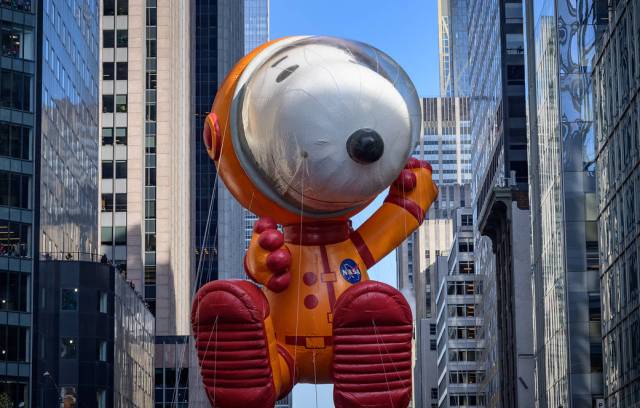 The Astronaut Snoopy balloon is seen floating along in the Macy's Thanksgiving Day Parade on, Thursday, Nov. 24, 2022, in New York City.