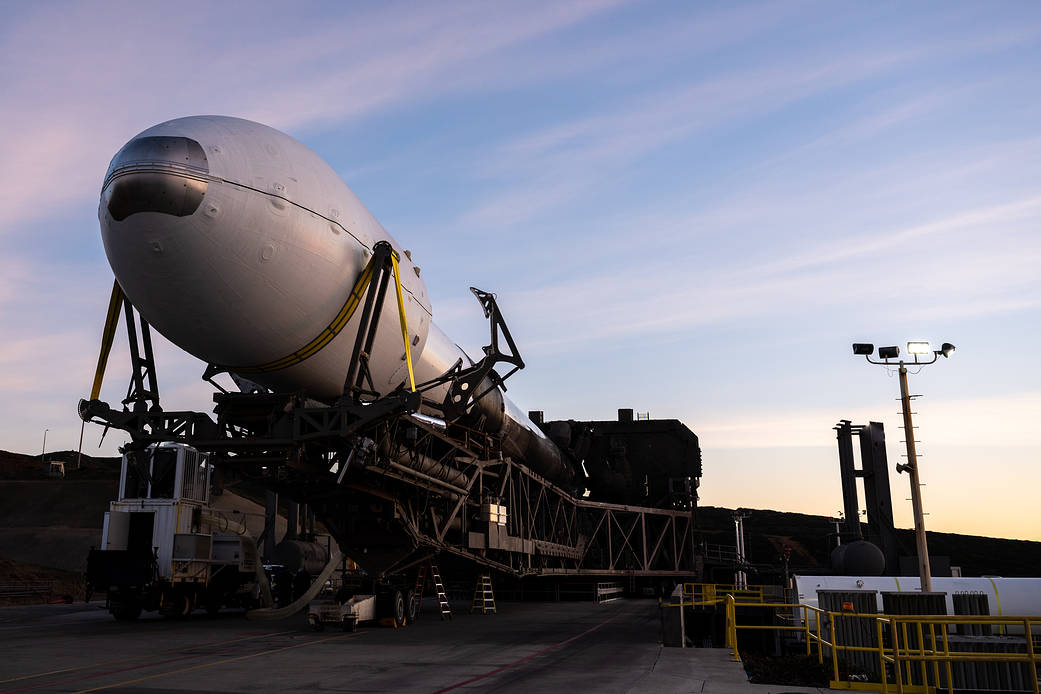 A SpaceX Falcon 9 rocket with the Surface Water and Ocean Topography spacecraft onboard is seen as it rolls out to the pad, Tuesday, Dec. 13, 2022, at Space Launch Complex 4E at Vandenberg Space Force Base in California. 