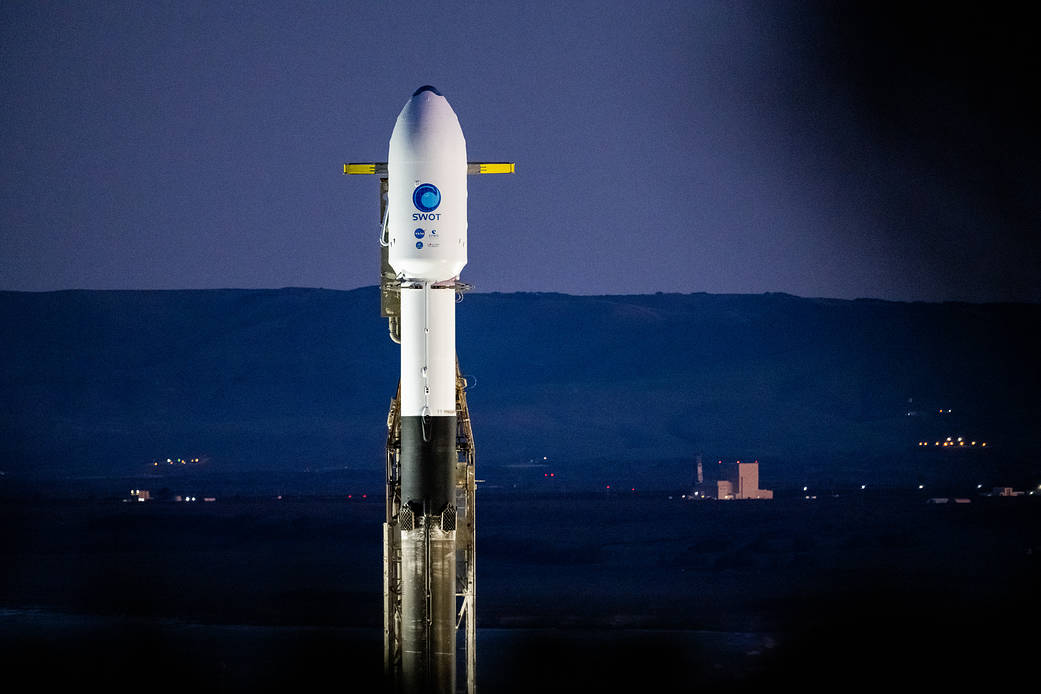 A SpaceX Falcon 9 rocket with the Surface Water and Ocean Topography spacecraft onboard is seen as preparations for launch continue, Wednesday, Dec. 14, 2022, at Space Launch Complex 4E at Vandenberg Space Force Base in California.